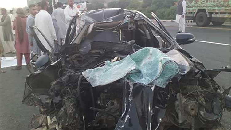 Three dead, five injured in trailer-car collision 