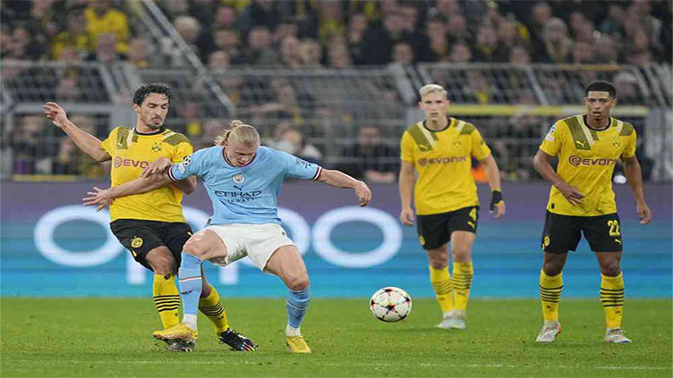 Dortmund draw 0-0 with Manchester City to join them in knockout stage