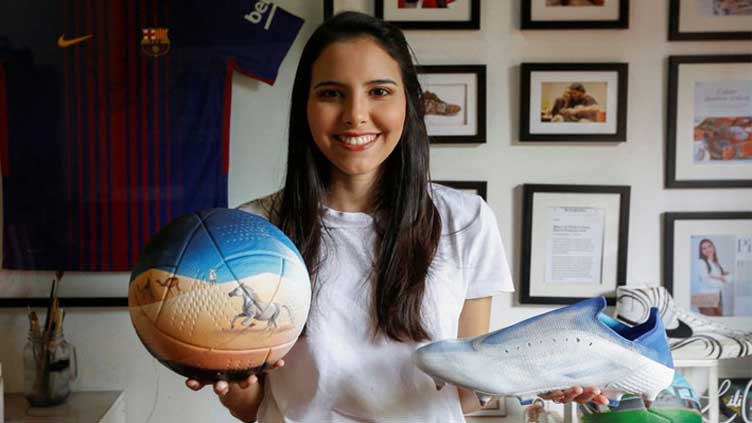  Paraguay artist who painted boots for Messi looks to bring color to World Cup