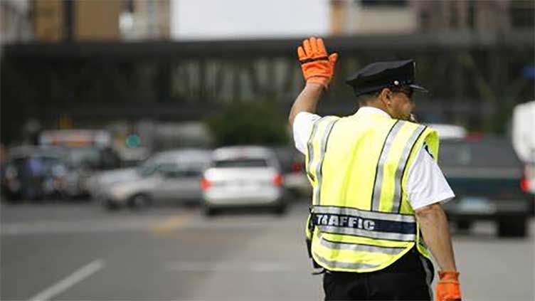 Video of 'traffic warden' clamping police car and arguing with officer was set up by online prankster