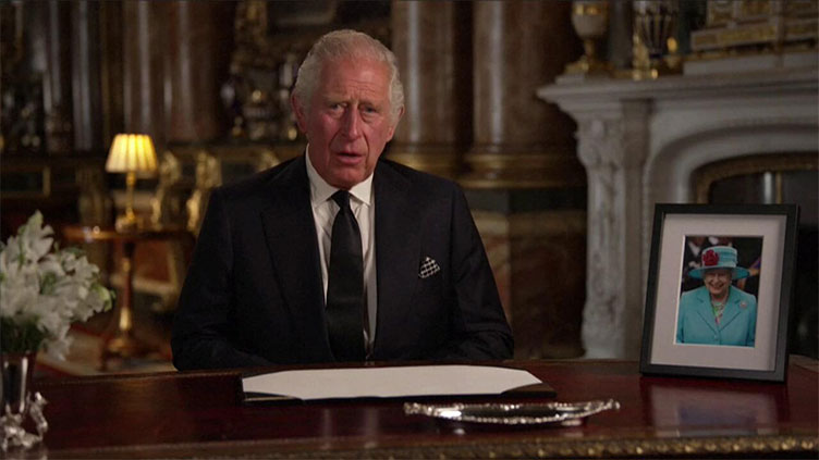 King Charles III vows 'lifelong service' as crowds mourn queen