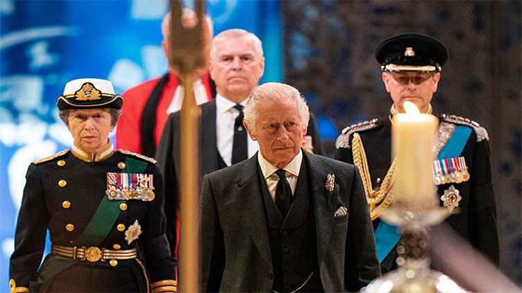 Royals stage vigil as mourners stream by queen's coffin