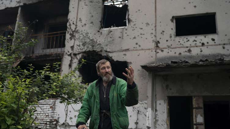 Devastated Ukrainian village emerges from Russian occupation