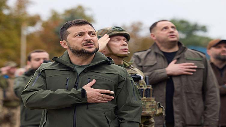 Zelensky visits recaptured hub of Izyum in east Ukraine