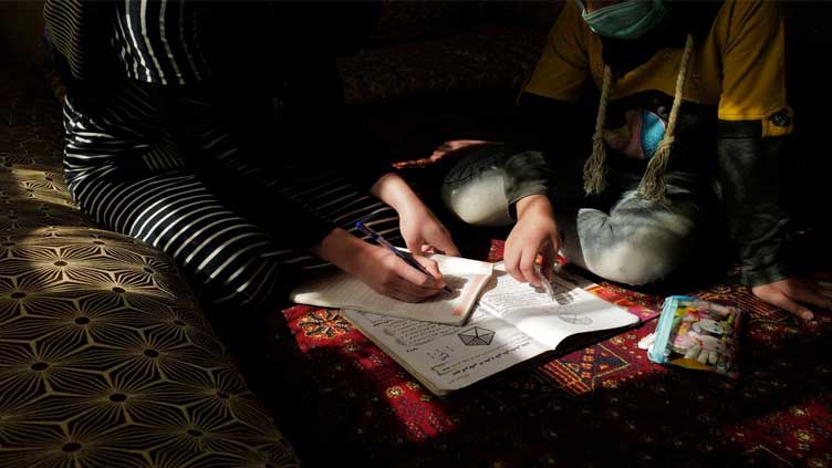 Afghans keep close watch as some girls' schools open, then shut