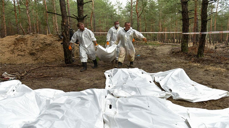 Outrage as Ukraine finds mass grave near liberated Izyum