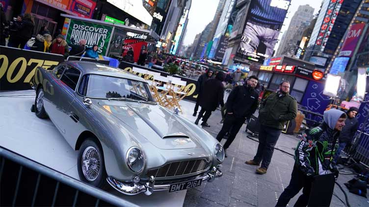 Aston Martin stunt car, Daniel Craig costumes star at James Bond auction