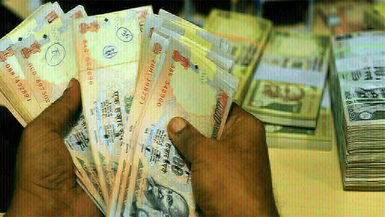 Indian rupee falls on oil concerns, but doesn't weaken past support level