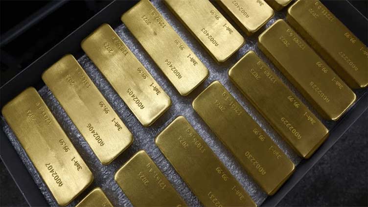 Gold drops as inflation risks after OPEC+ oil target cut raise Fed hike odds