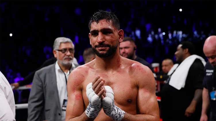 Drug disaster throws boxer Amir Khan out of ring for two years