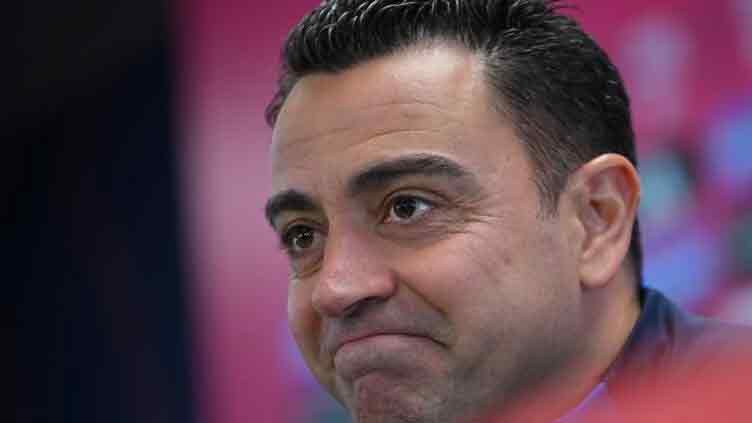 Xavi expecting 'wounded' Madrid to wage war in cup Clasico