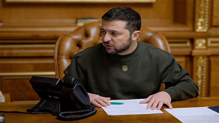 Ukraine's Zelenskiy aims for Western warplane coalition; Russians pressure Bakhmut