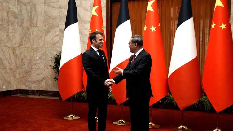 Macron meets China's Li as EU leaders begin Beijing talks