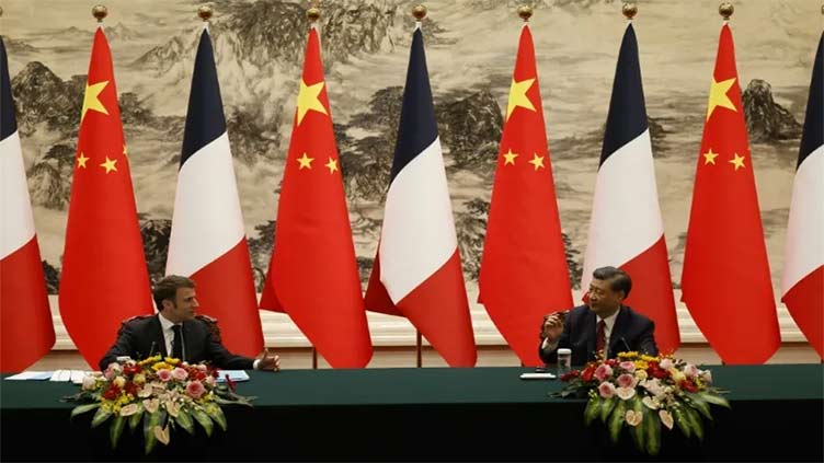 Macron in Guangzhou on final day of China trip