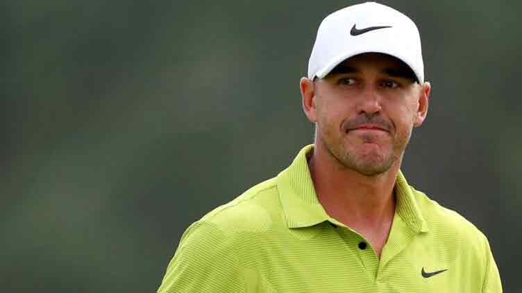 Co-leader Koepka set for early charge as Masters resumes
