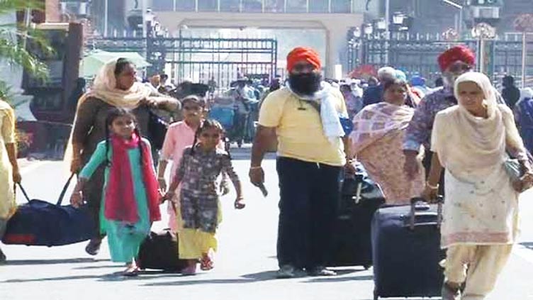 Sikh pilgrims from India arrive in Pakistan to attend Baisakhi festival