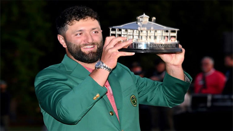 Jon Rahm pulls away to claim first Masters title