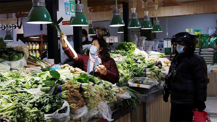 China's consumer, factory prices skid as demand falters