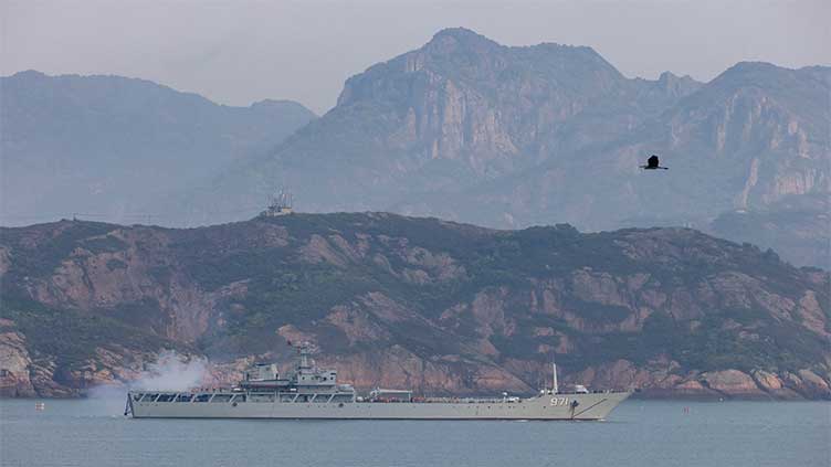 Chinese aircraft, ships remain around Taiwan after drills end