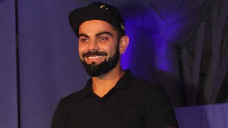 Virat Kohli beams with joy in new snap with baby girl Vamika   