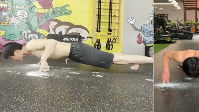 Chinese man sets world record for four-finger pushups with claps