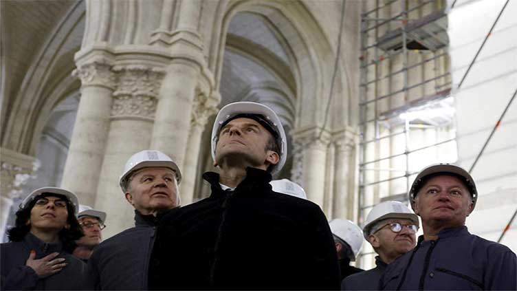 France's Macron tours Notre Dame Cathedral reconstruction