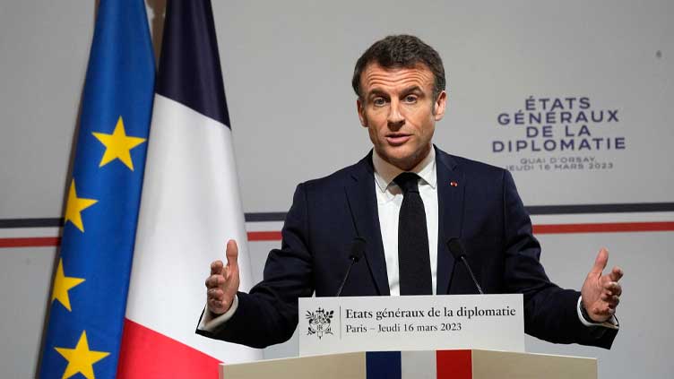 Macron signs controversial pension reform bill into law overnight