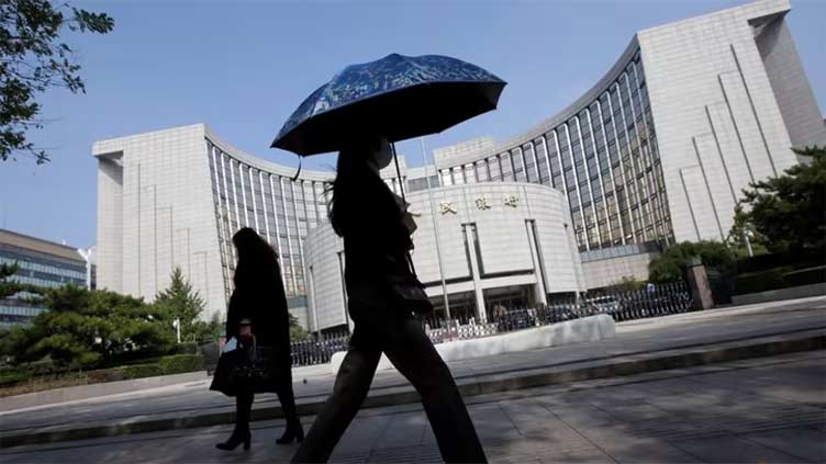 Analysis: China's 'atypical' deflation cycle gives central bank a headache