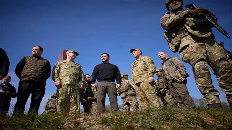 Ukraine's Zelenskiy visits border with Belarus and Poland