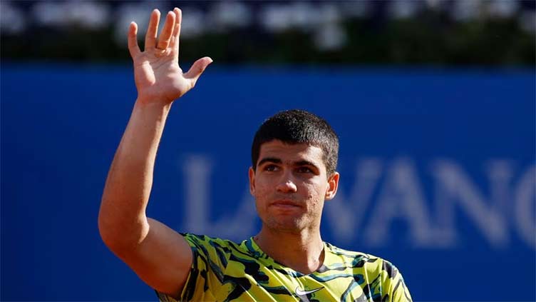 Alcaraz beats Evans to set up Barcelona final with Tsitsipas