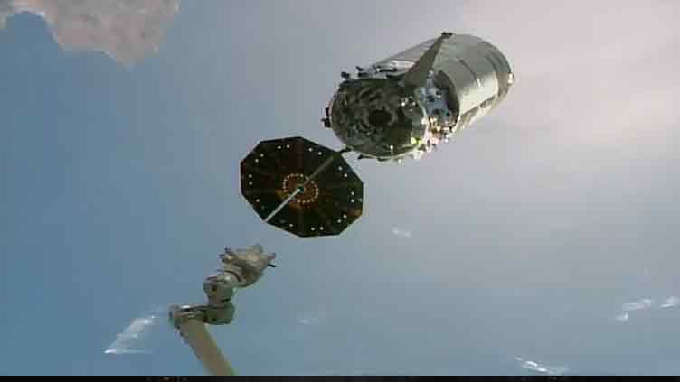 Robotic arm releases Cygnus space freighter from Station