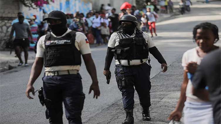 Haitian residents lynch and set fire to suspected gang members