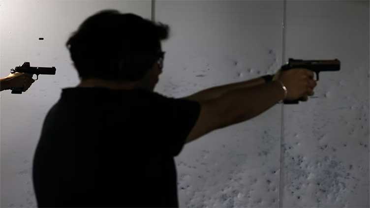 Chileans buy more guns, private guards as security tops concerns