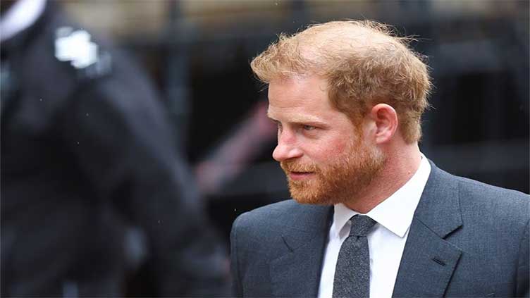 Prince Harry takes on Murdoch unit over phone-hacking, brother 'settled'