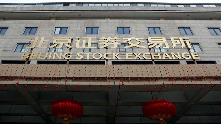 Investors pile into cash, but snap up Chinese stocks in tricky markets