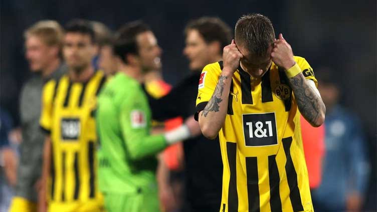 Leaders Dortmund stumble in title race with 1-1 draw at Bochum