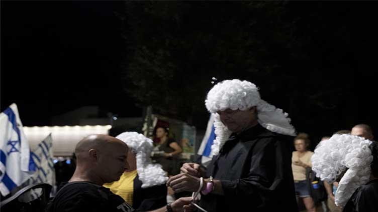 Israeli protesters are calling for democracy. But what about the occupation of Palestinians?