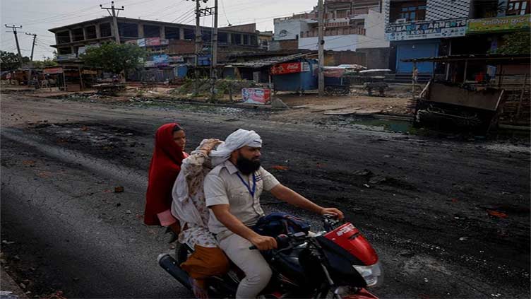 Hindu-Muslim riots expose risk at major Indian business hub