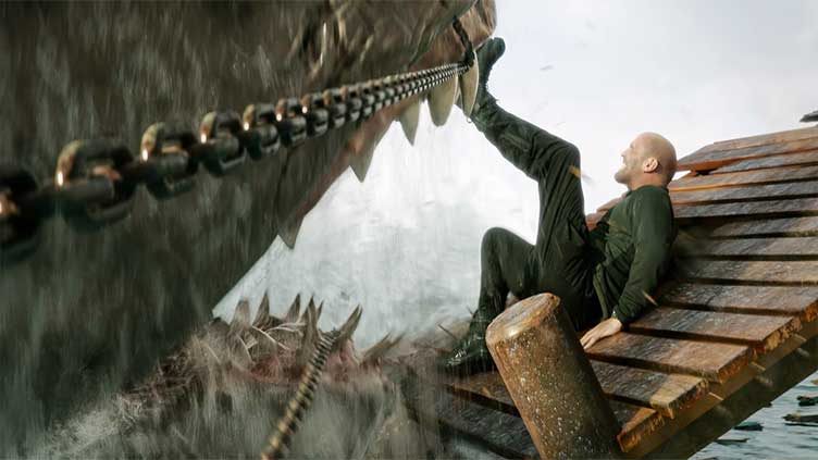 Movie Review: Spoiler alert! Jason Statham jumps even bigger sharks in 'Meg 2.' (Also, dinosaurs)