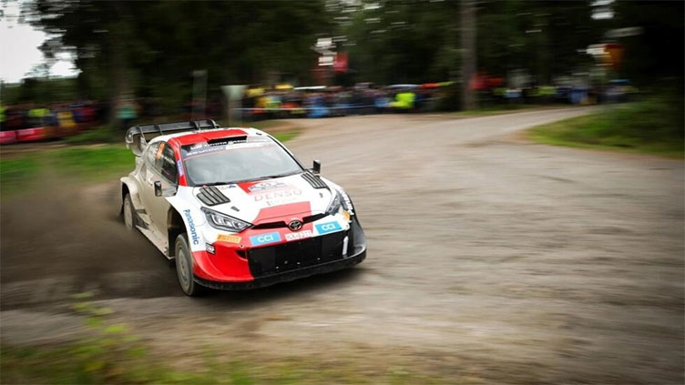 Evans leads in Finland after Rovanpera rolls his car