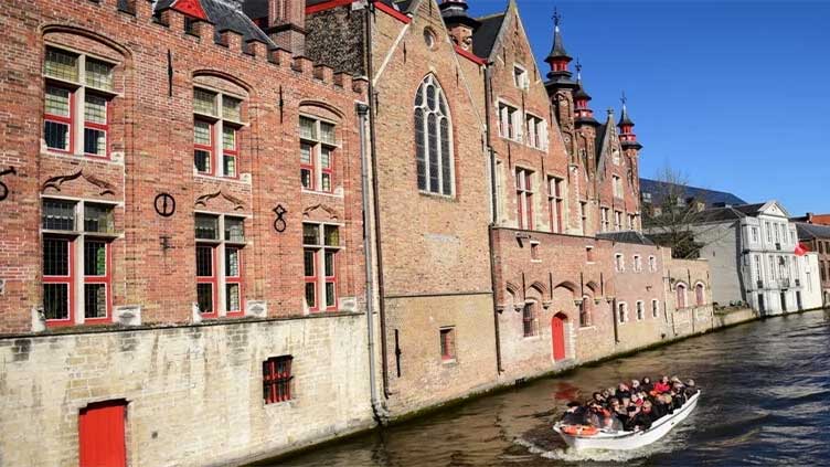 Belgium canal city of Bruges hits 'red line' with tourist crowds