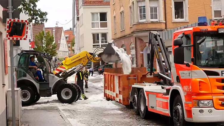 German city deploys snowploughs after summer storm