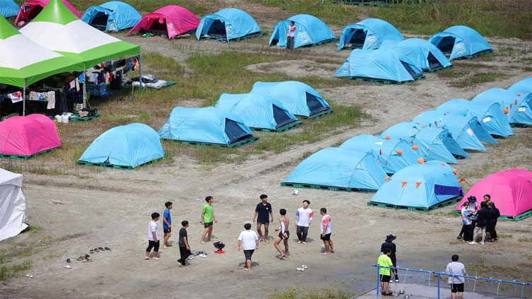 After heat, typhoon threatens misery for South Korea scout jamboree