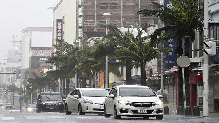 Tropical storm hits Japan's Okinawa islands again, unleashing torrential rain