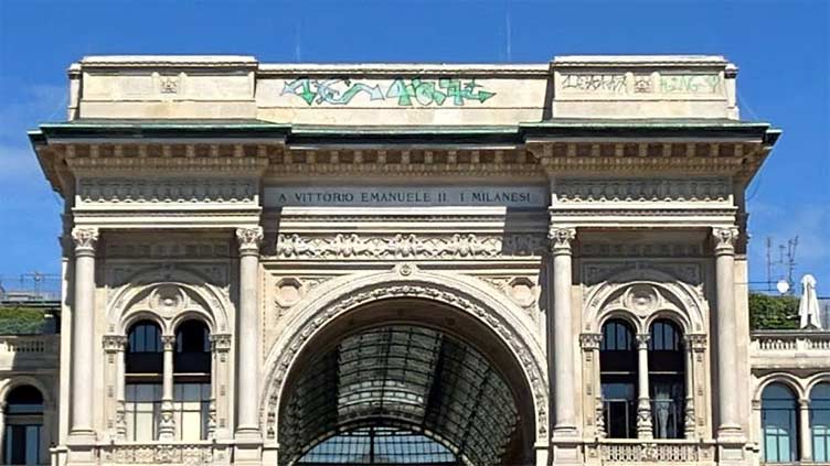 Graffiti artists tag Milan's famed Galleria arcade