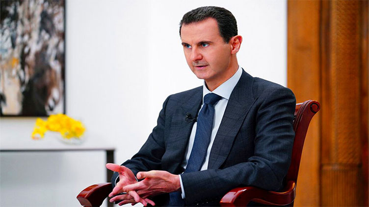 Syria's Assad tamps down expectations of closer ties with Turkey, Arab world