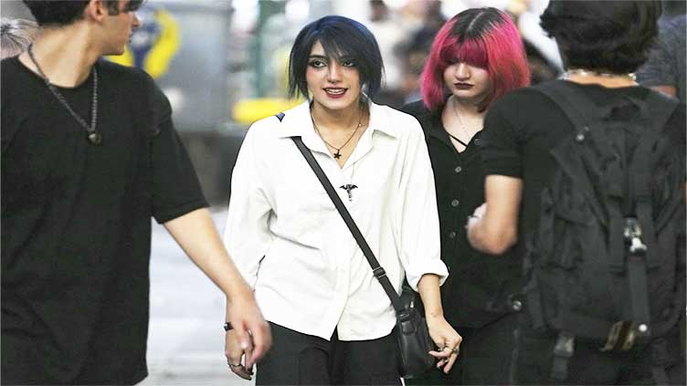 A year ago, an Iranian woman's death sparked hijab protests. Now businesses are a new battleground