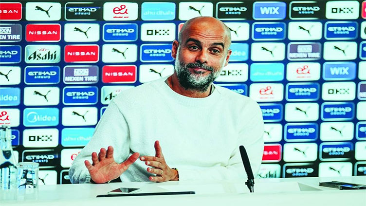 Guardiola says Man City treble 'once in a lifetime' feat