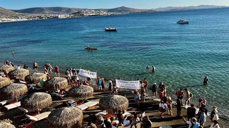 Greeks protest for space on the beach as pricey sunbeds multiply