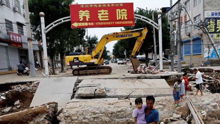 Floods, mudslides kill two in northwestern China city